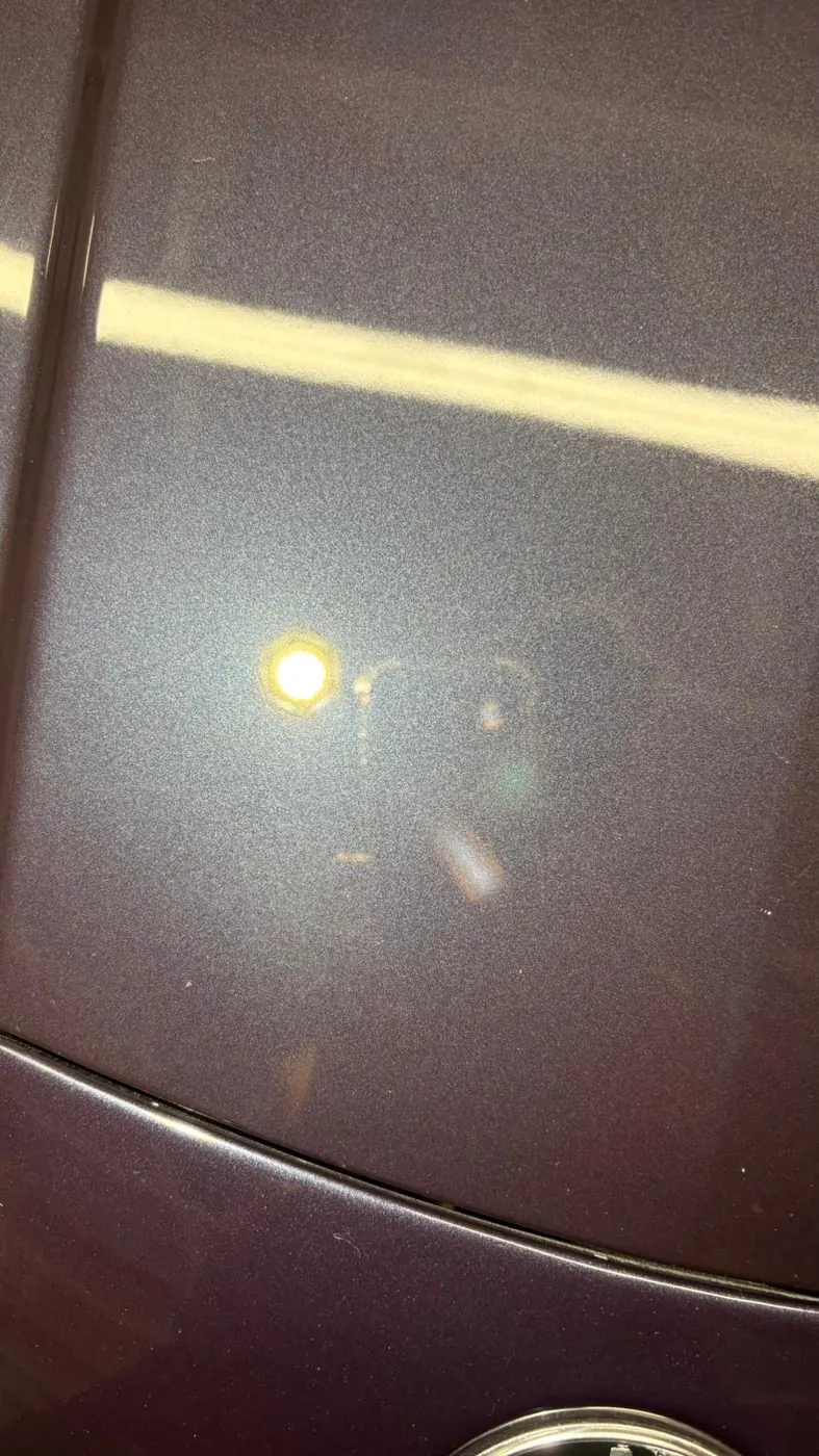 The same purple paintwork after correction