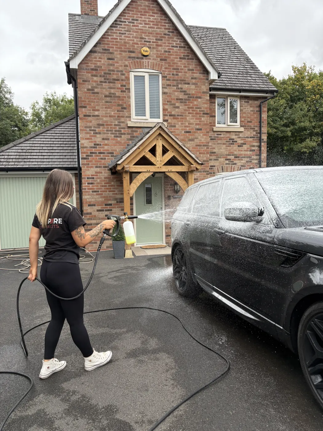 Bee safe-washing a car