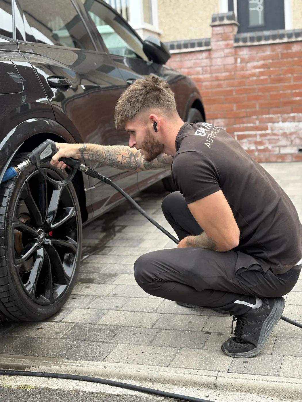 Brandon detailing a wheel