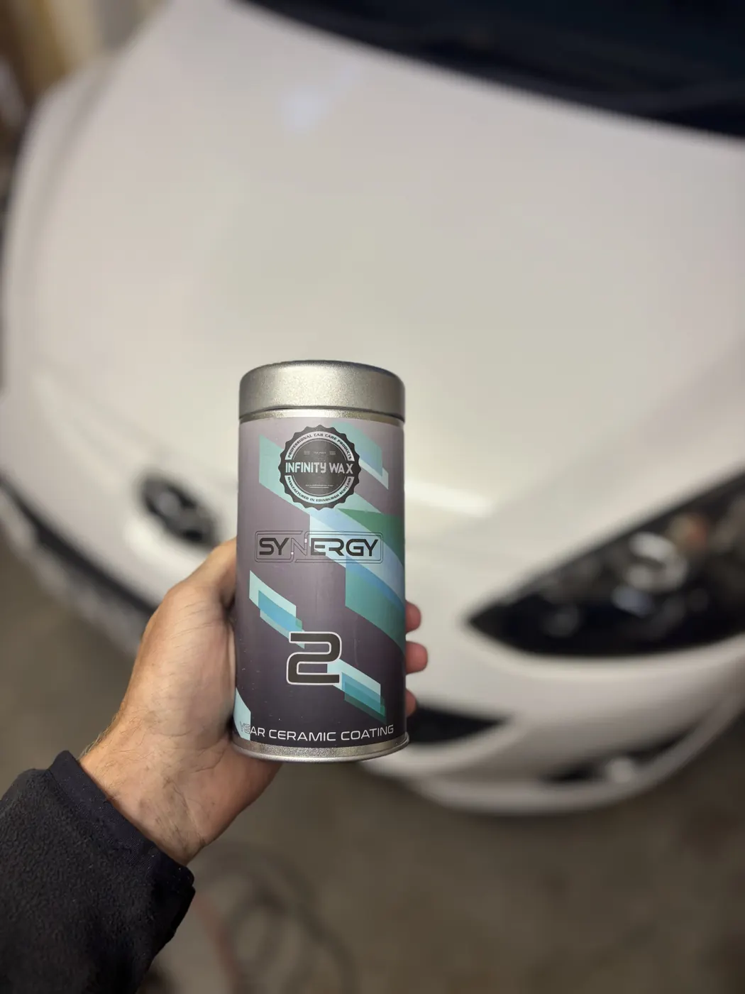 Ceramic coating bottle used by Empire Auto Valets