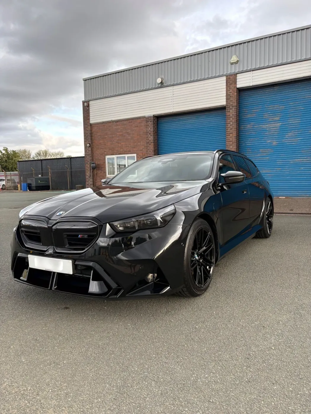 Black BMW M5 Touring after an Empire detail